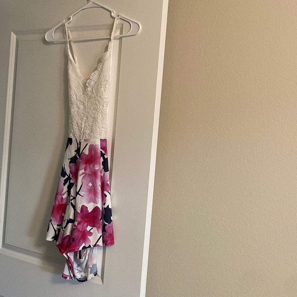 White and floral romper
